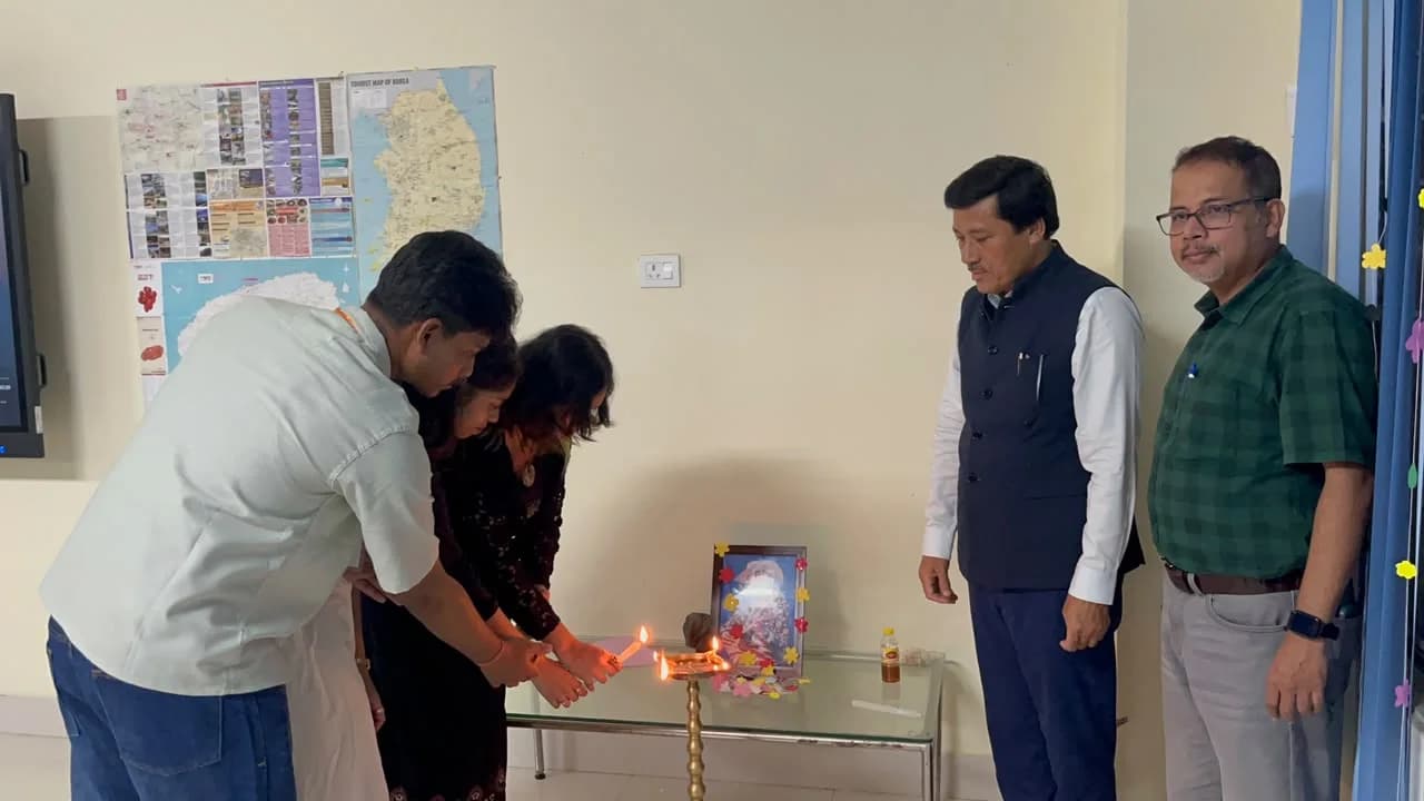 Guests and members lighting the lamp together